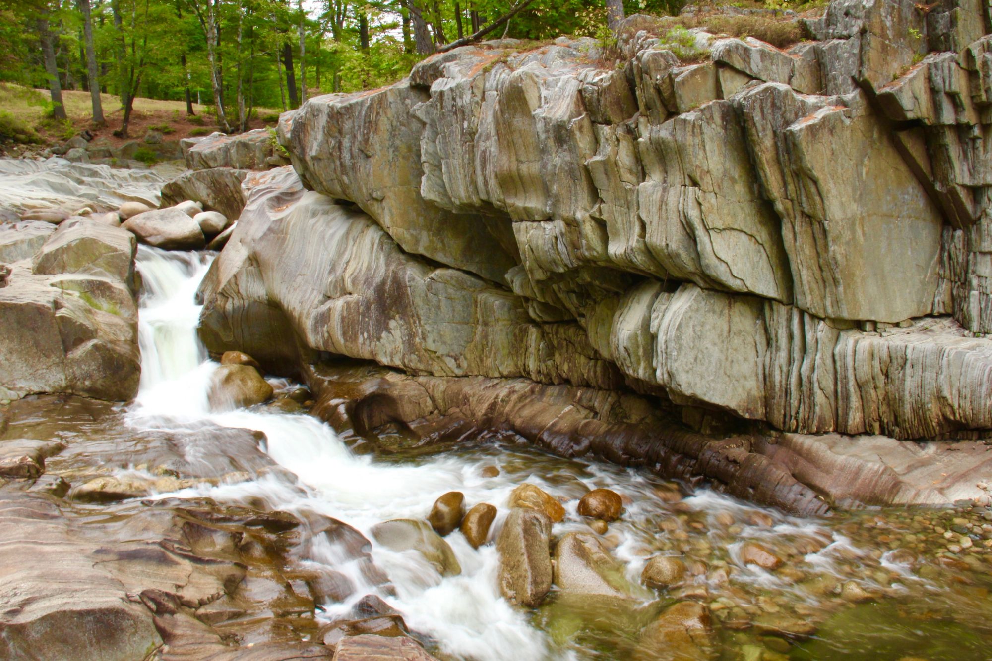 The Swift River rushing over granite ledges through Coos Canyon